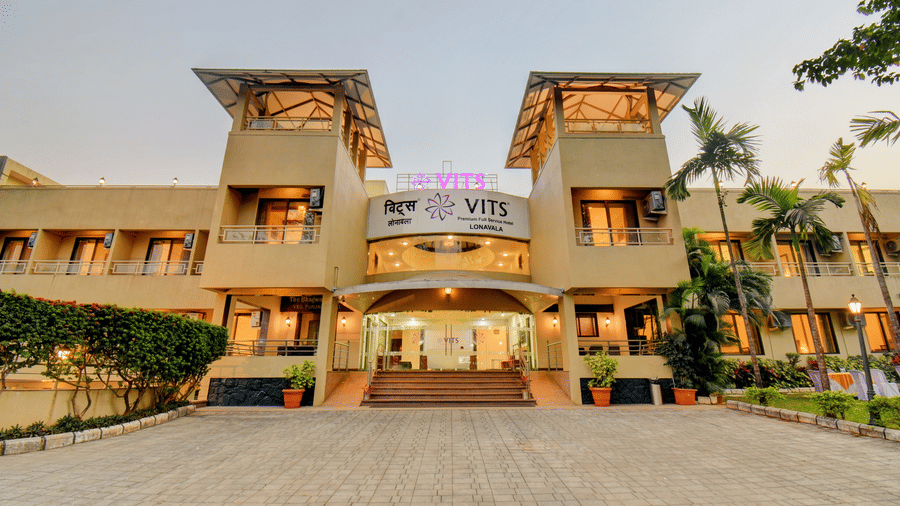 Front entrance of VITS Lonavala with landscaped driveway and modern facade.