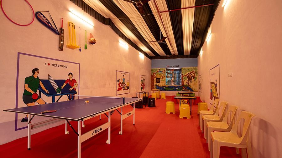  A vibrant playroom featuring artistic wall decor, bright colours, and comfortable seating arranged around the room - VITS Select Diamond Resort, Sasan Gir