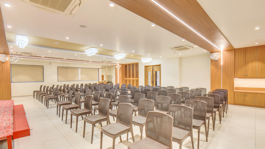 Event hall arranged in classroom style with rows of chairs facing the presentation area at VITS Select Nashik Hotels & Resorts 