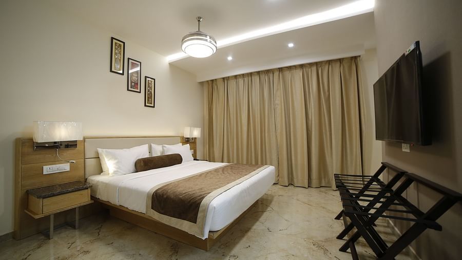 image of a king size bed in superior room at voyage annapurna de royal, guntur