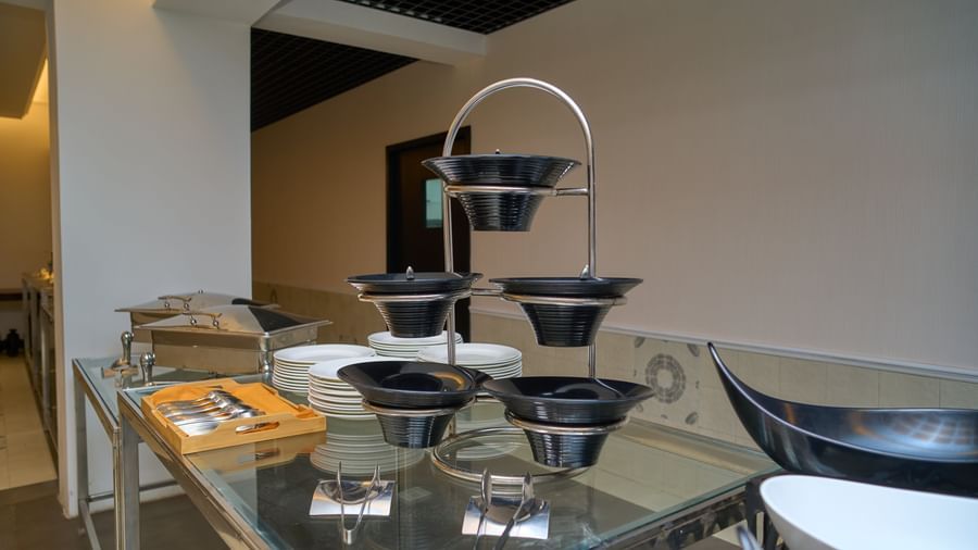 Buffet counter with food display at Voyage Milestone Hotel and Banquet.