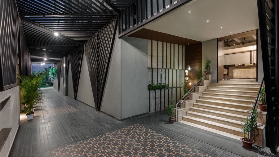Stairway and entrance lobby at Voyage Milestone Hotel and Banquet.