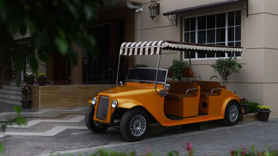 Image of a vintage car parked in front of a building at 