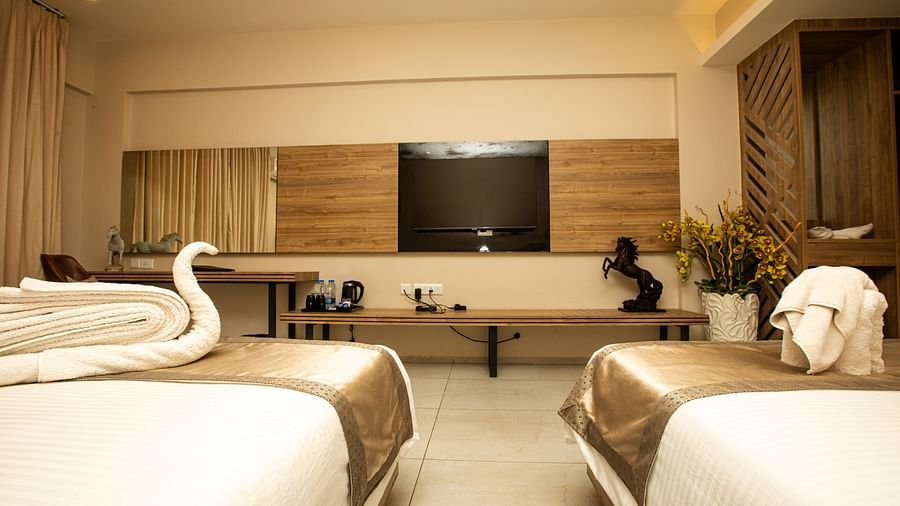 Picture of the interior of the well furnished  room with a king bed