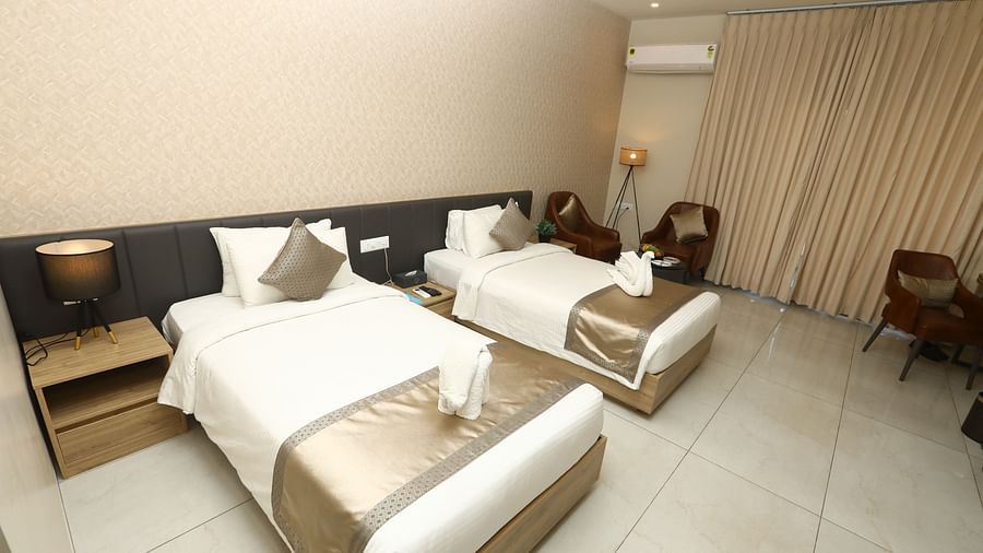 Picture of the interior of the room with two huge beds