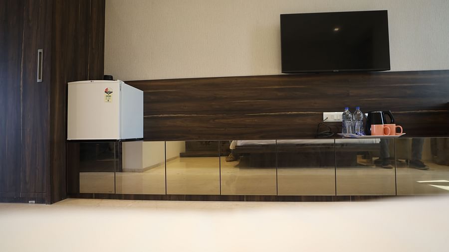 Minibar television and refreshments in a hotel room