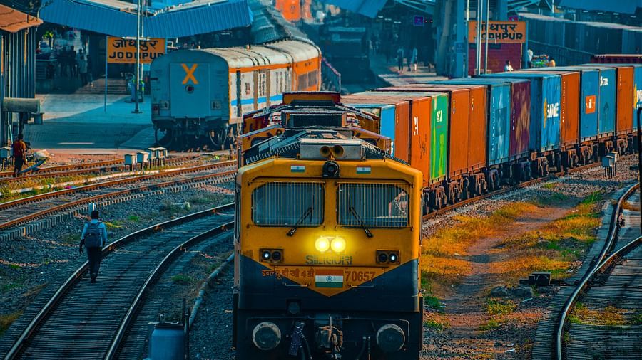 Train traveling through a city.