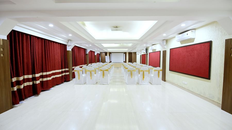 the indoor seating space at the banquet hall in Khandala - Zara's Resort 1