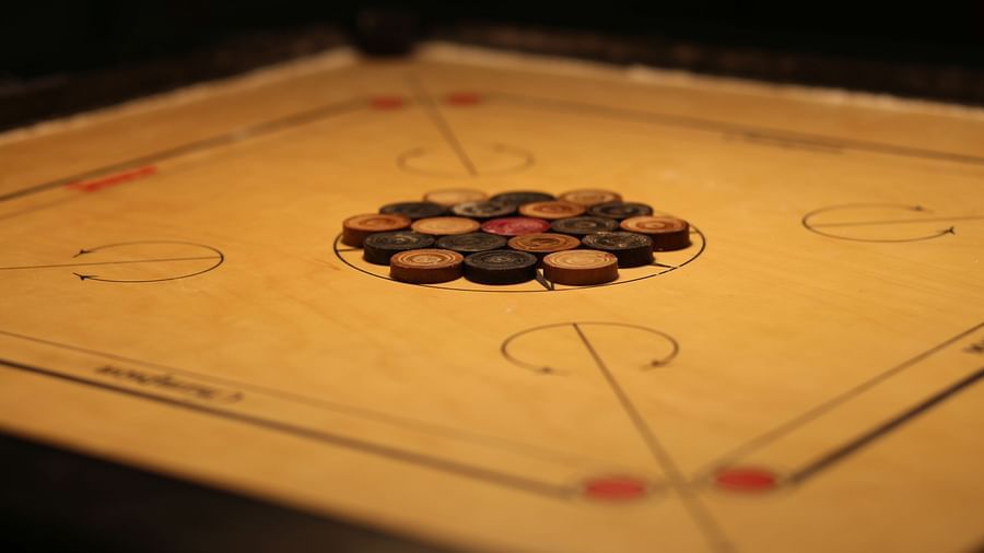a close-up view of a carom board - Zara's Resort