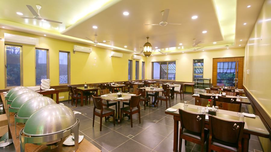 the indoor seating space at the restaurant - Zara's Resort 2