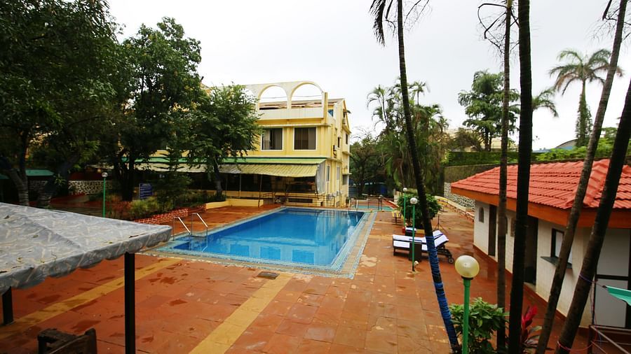 the swimming pool area - Zara's Resort  5