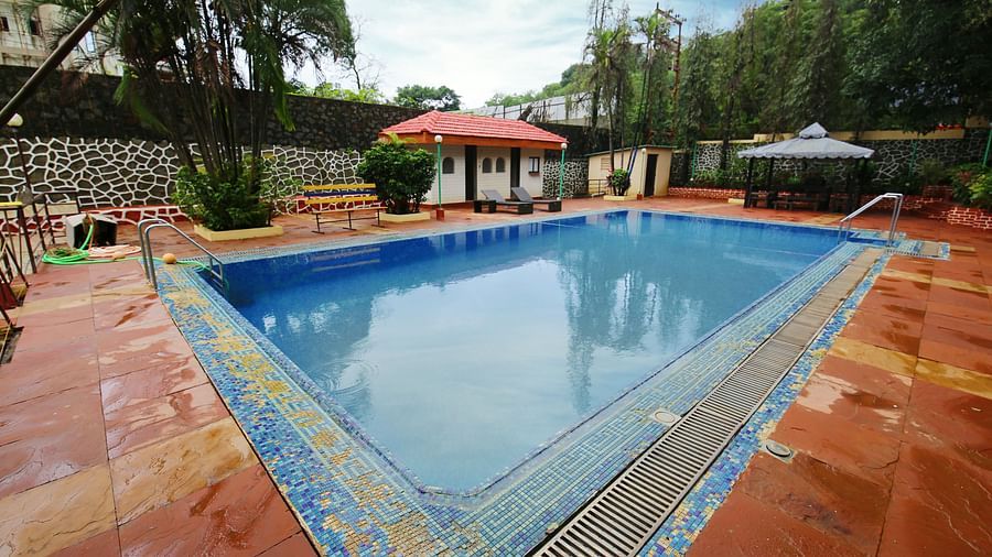 the swimming pool area - Zara's Resort 1