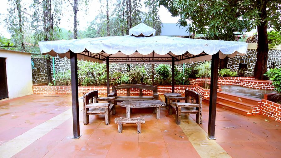 the outside seating space at the resort in Lonavala - Zara's Resort