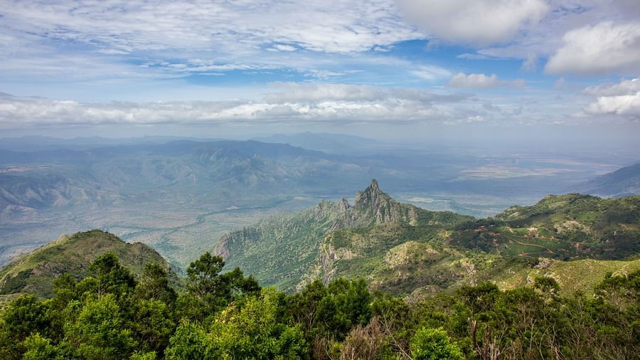 a sunset view point with hills surrounding