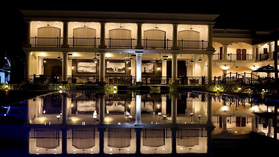 Lagoon De Pondy reflected in pool at night