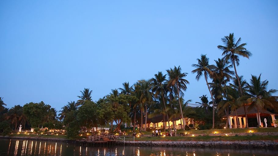 view of Lagoon De Pondy Resort from across backwaters