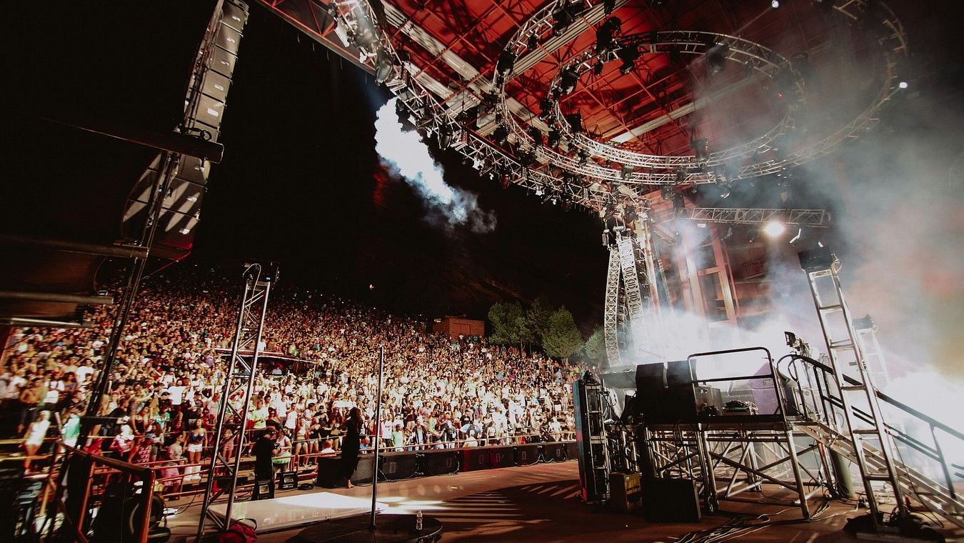 Rock music concert with an energetic crowd.