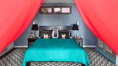 bed with teal bedcover