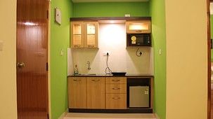 Hotel Arama Suites Bangalore kitchenette 1 aura suite  hotel arama suites bangalore