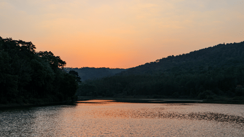 An overview of Hirekolale Lake with different hues in the sky after the sunset