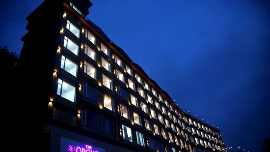 Facade with every window lit up at night- The Orchid Hotel Shimla