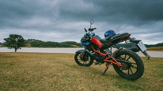 Bike parked near a water body