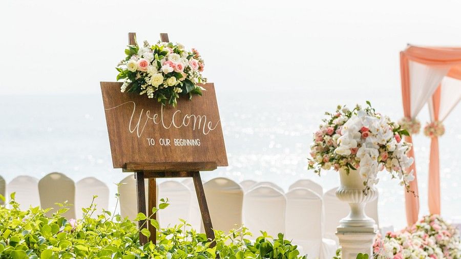 a canvas welcomming the guests to the wedding decorated with flowers - Maikhao Dream Villa Resort & Spa, Phuket