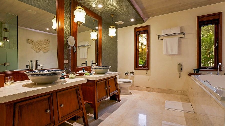 image of a luxurious bathroom with two sinks - one bedroom private pool beachfront villa