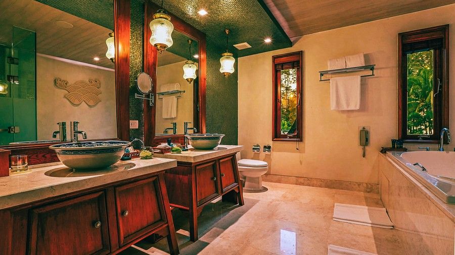 image of a bathroom with luxurious interiors with two wash basins - three bedroom private pool villa