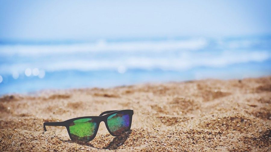sunglasses on a beach
