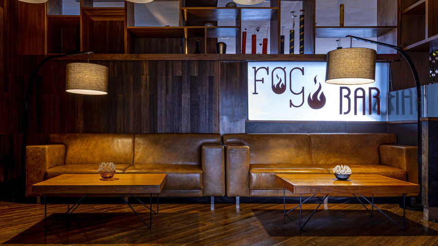 An overview of the seating arrangement with the signage of FOGO NO CHÃO in view - Ramada by Wyndham Addis, Addis Ababa
