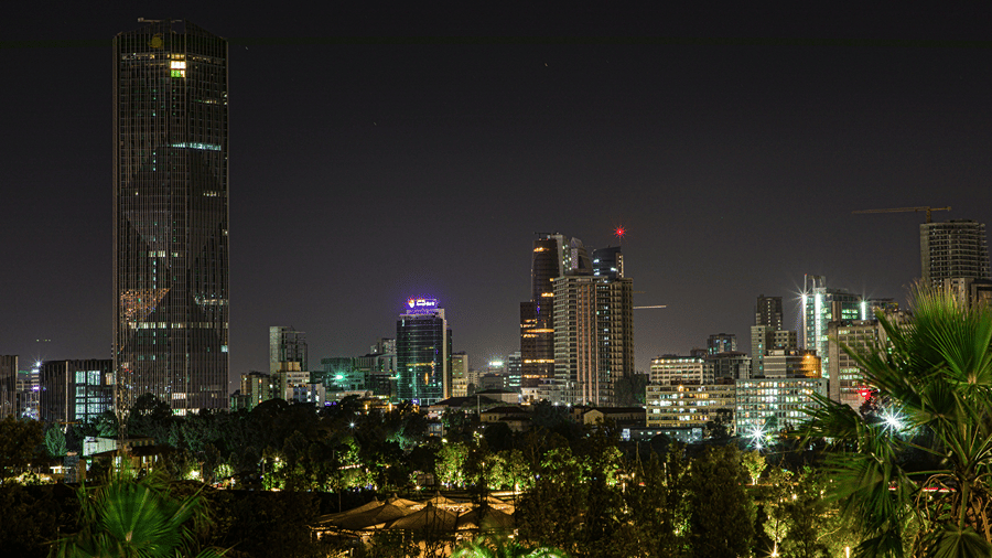 Addis Ababa at night featuring well-lit skyscrapers and buildings