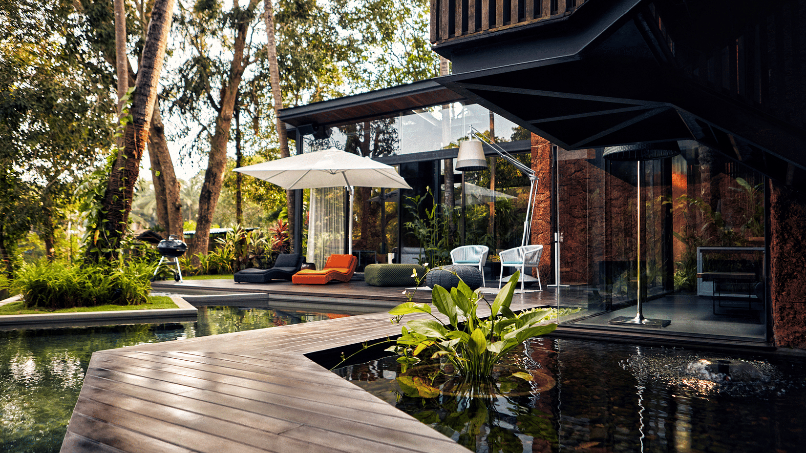 Walkway surrounded by pools leading to the villa - Villa in Palms by V Escapes
