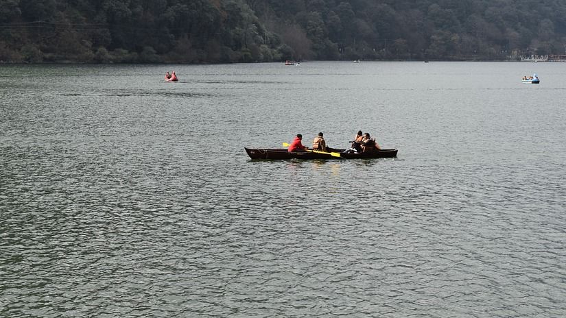 people boating across a river