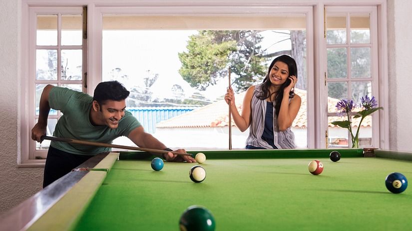 guests playing pool at The Carlton Hotel Kodaikanal 