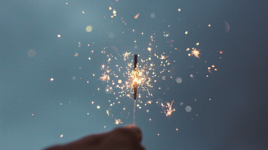 a person holding a firework