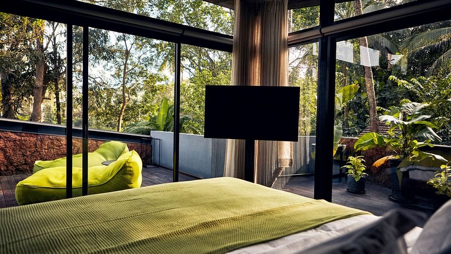 A luxurious bed in an accommodation at Villa In Palms by V Escapes.