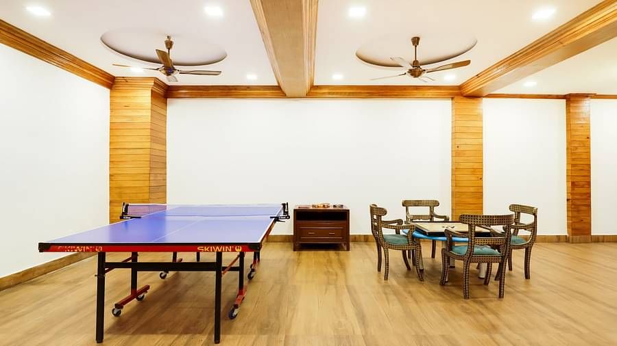 Indoor table tennis and carrom setup at Summit Barsana Resort & Spa, Kalimpong