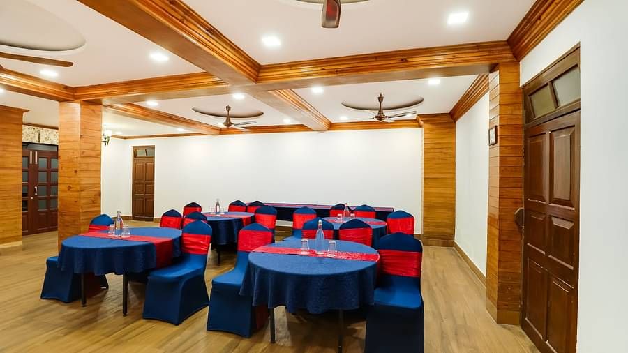 Seating arrangement in the banquet hall at Summit Barsana Resort & Spa, Kalimpong