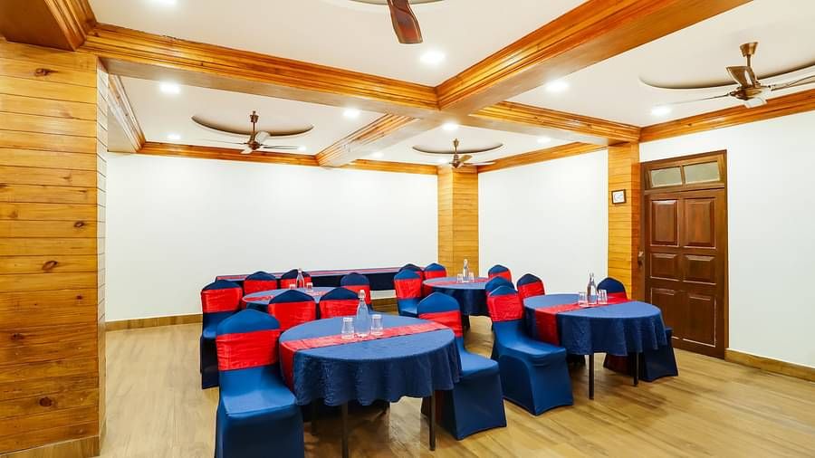 Seating arrangement in the banquet hall at Summit Barsana Resort & Spa, Kalimpong
