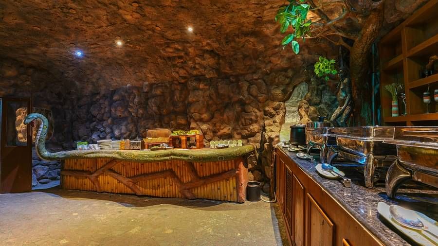 Kholong restaurant with a rock-themed décor, warm lighting, all tables, seating, and culinary arrangements arranged aesthetically4