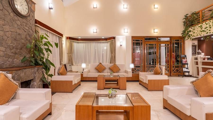 lobby area with comfortable seating at Summit Lillium Hotel & Spa, Kalimpong