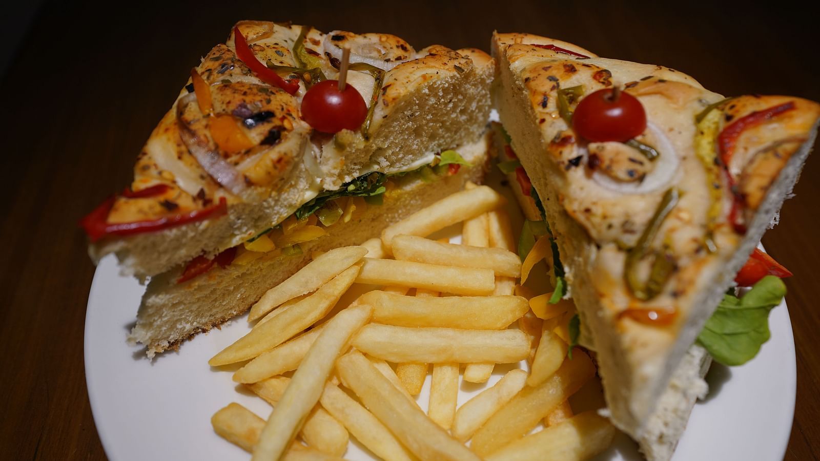 An image of club sandwiches and fries - Argo By Trance, Goa