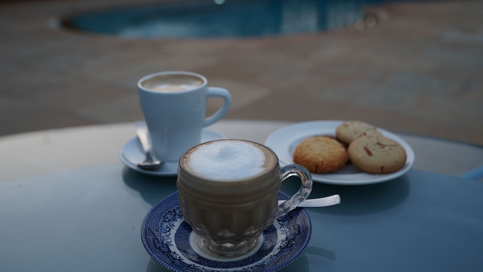 An image of a tea table where tea, coffee, and some biscuits are placed - Argo By Trance, Goa
