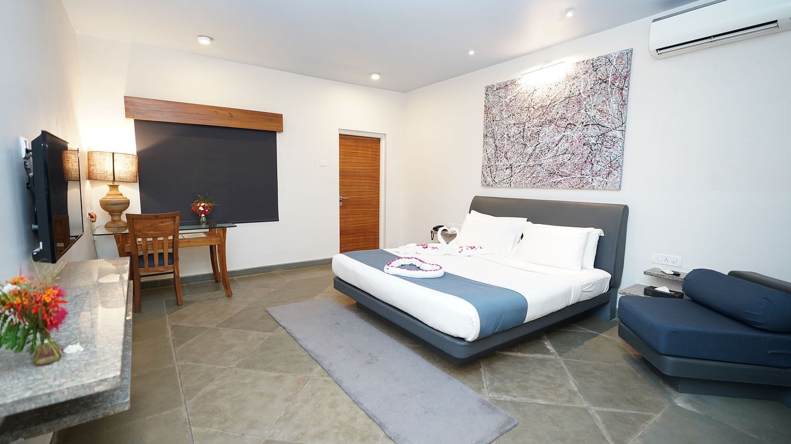 An image of a bedroom with king size bed, a TV, and other essentials - Argo By Trance, Goa