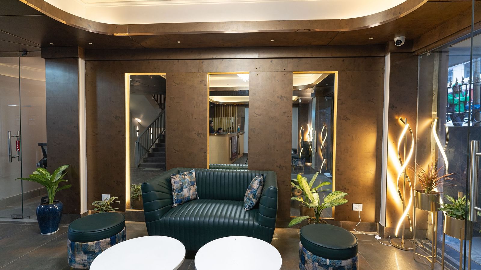 Lobby area with sofas and table at Soma Hotel by Avianna Group