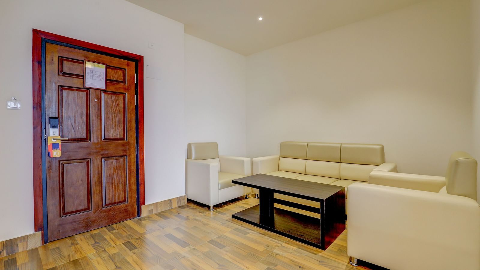 living area with comfortable sofas of a Premium Room at Banari Regency by Summit, Namchi