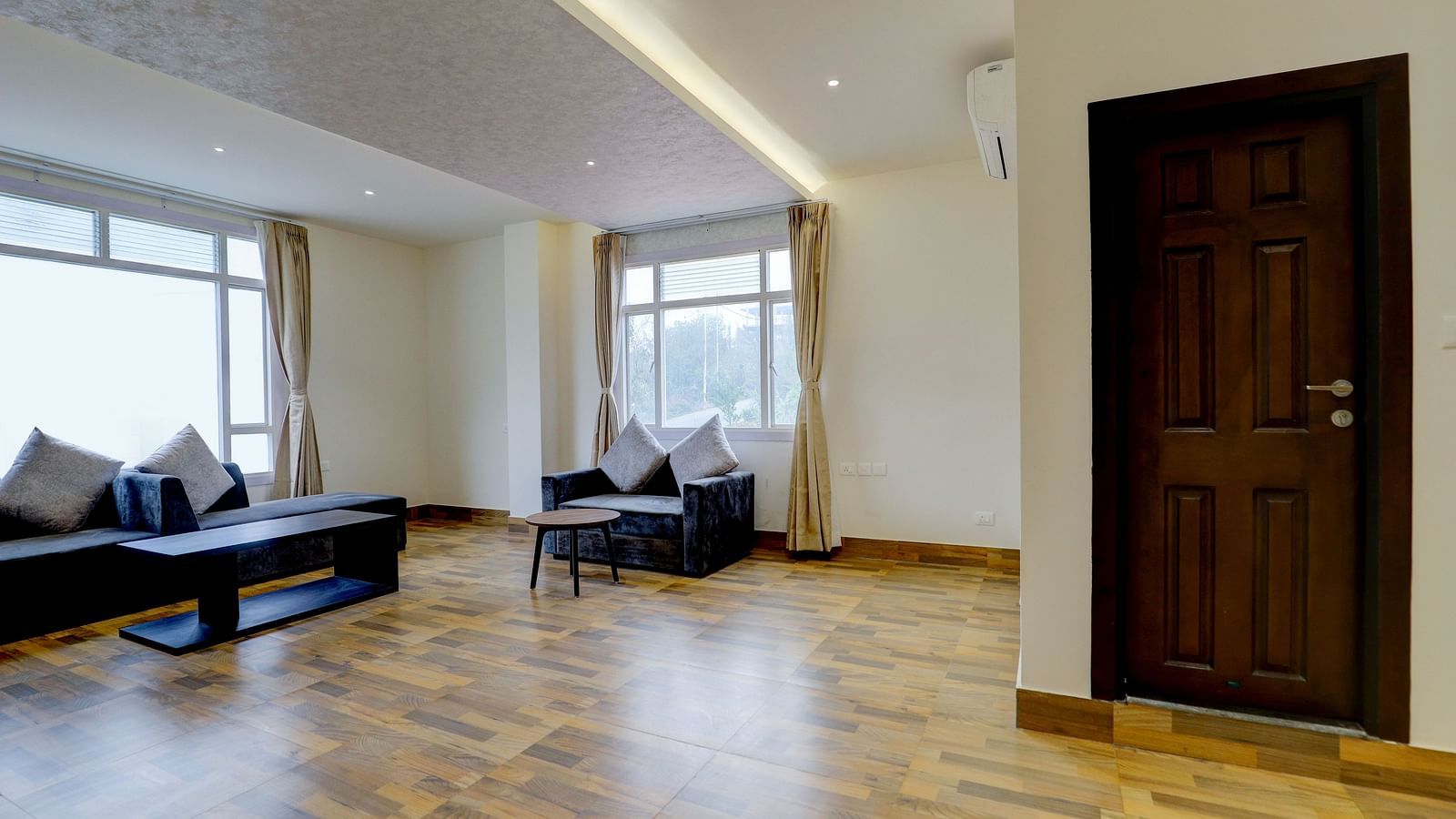 view of the living area with sofas of Suite at Banari Regency by Summit, Namchi