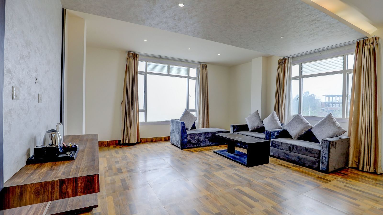 view of the living area with sofas of Suite at Banari Regency by Summit, Namchi