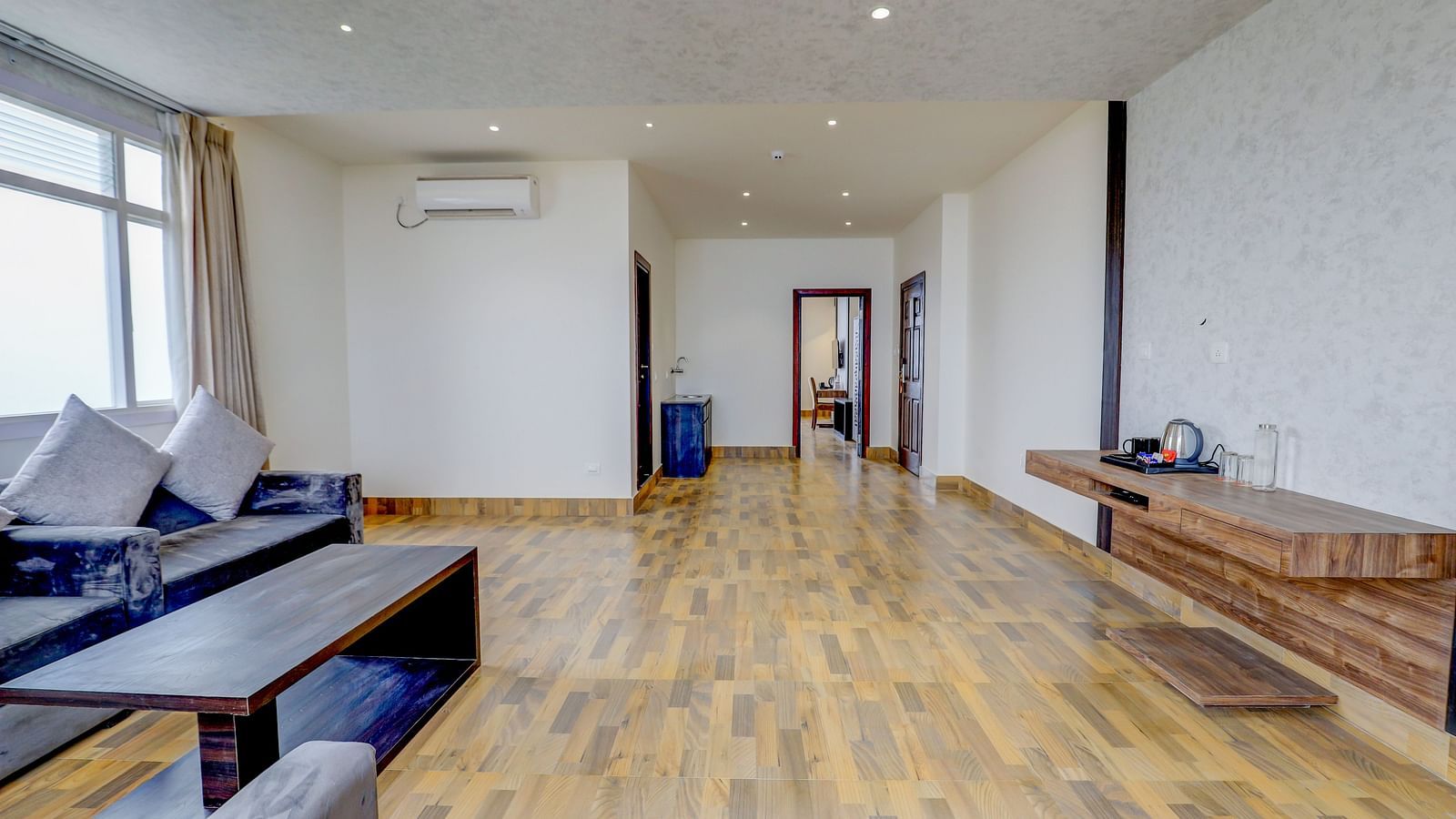view of the living area with sofas of Suite at Banari Regency by Summit, Namchi